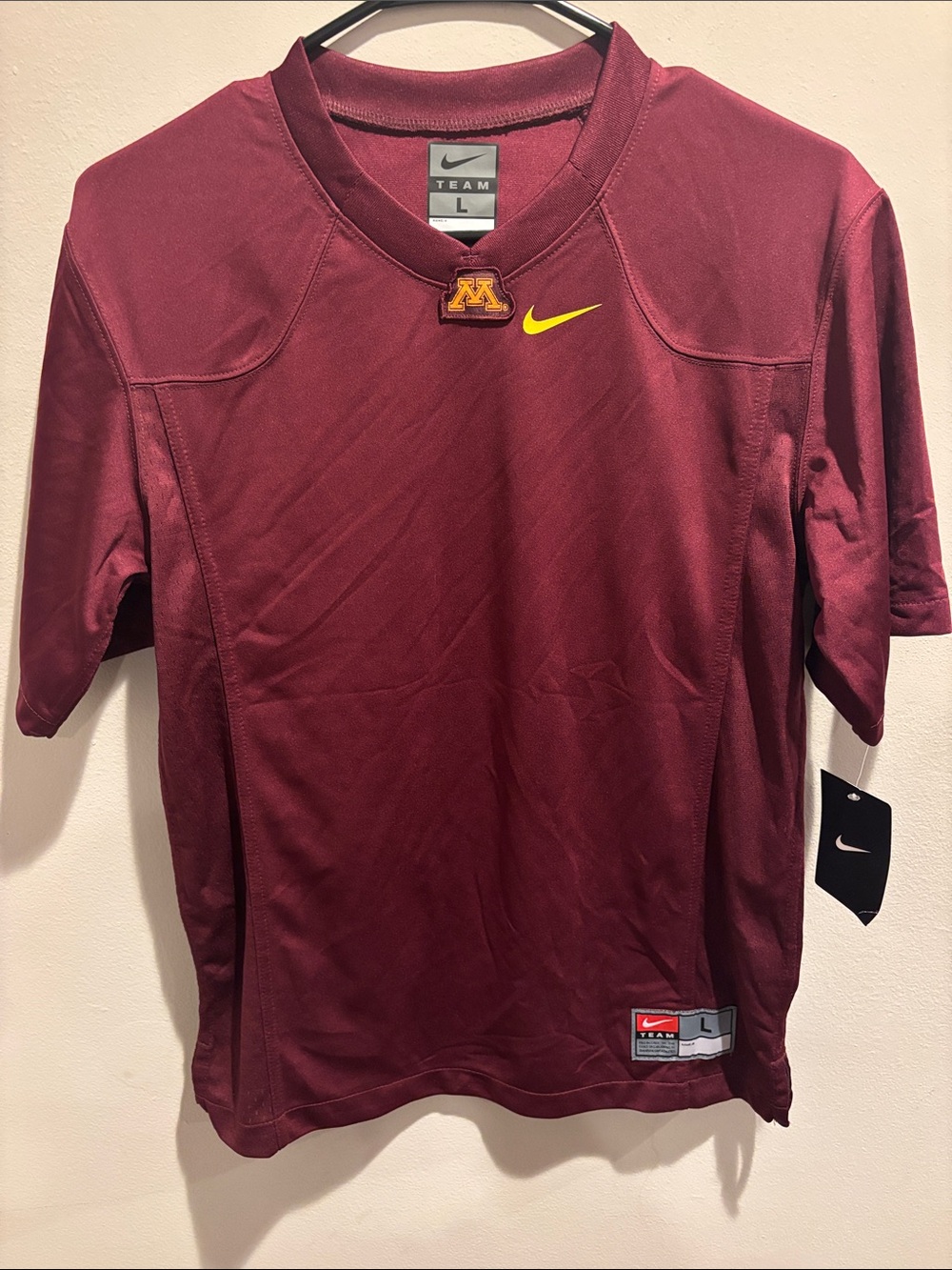 Kids Nike Maroon Short-Sleeve Team Football Jersey with Yellow Swoosh